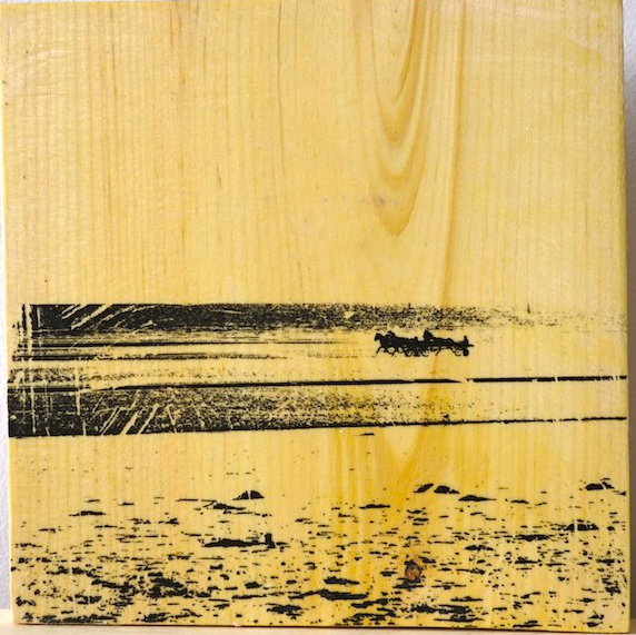 Fine art photography on wood of trap racing horses on Utah Beach in France