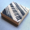 Untickled Ivories piano in antiques shop, Toronto, Canada