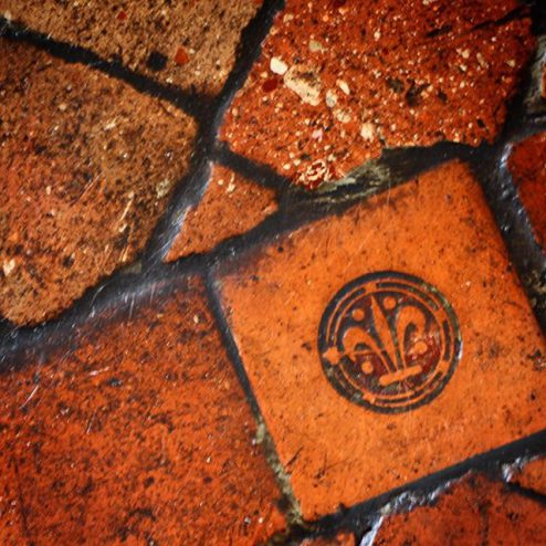 Fleur de lys tile, flower of lis terracotta, Chenonceau castle, Loire Valley, France