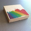 SIlhouette of Toronto with rainbow Pride spray art