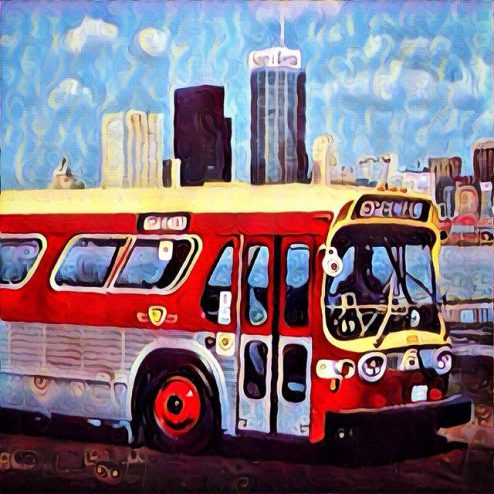 TTC bus from the 1970s against the skyline of Toronto